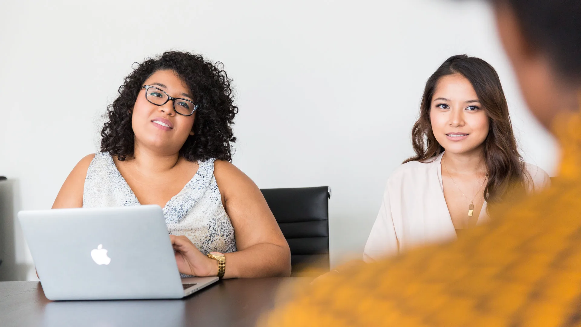 Professional interview setting in a bright Scandinavian office