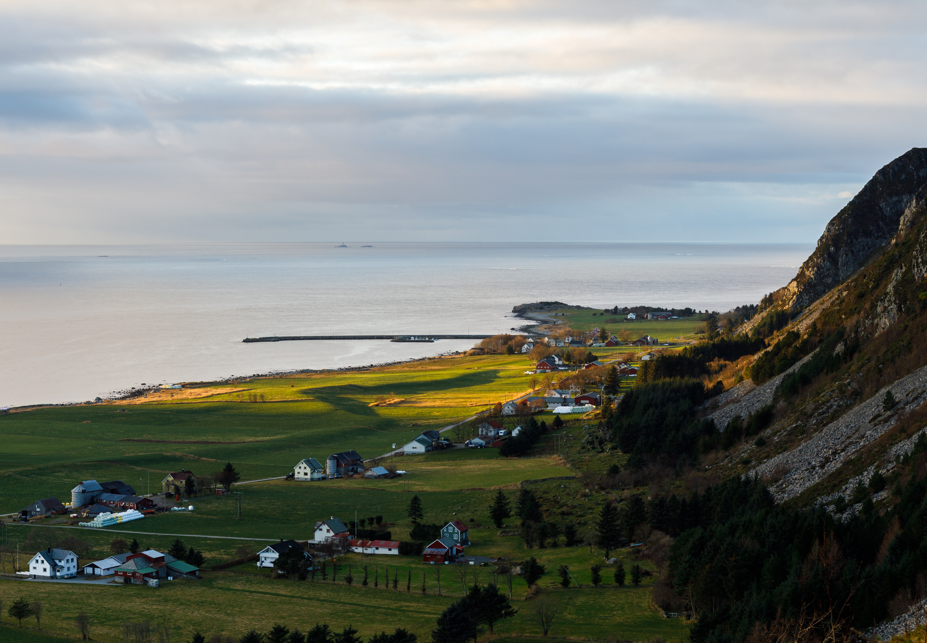 Mountain peaks and coastal landscape in Nordøyane