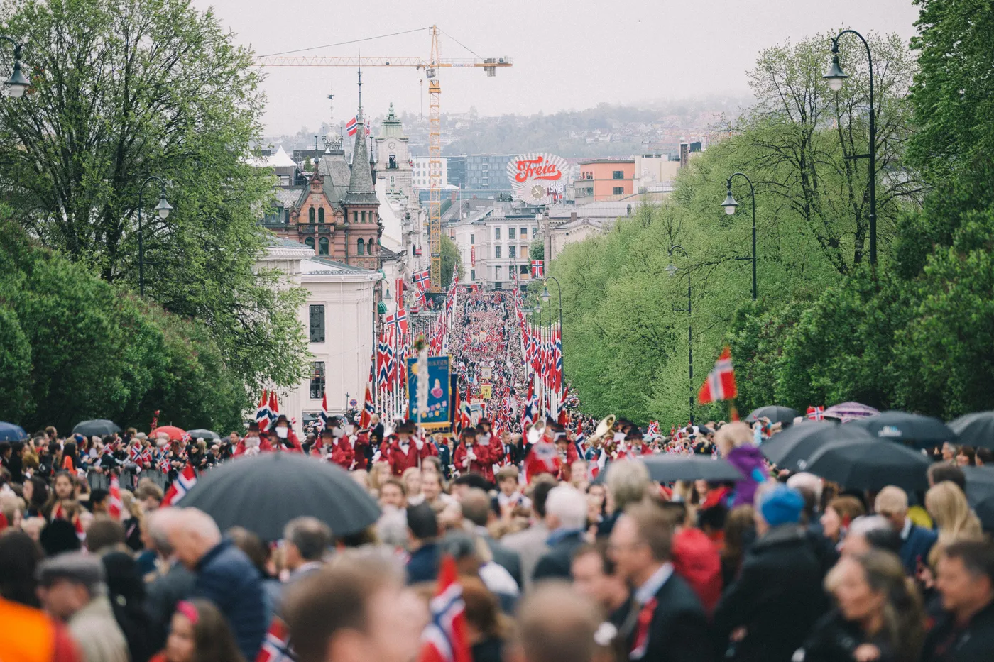Thousands of people filling Karl Johans gate during the 17th of May parade in Oslo, seen from the Royal Palace