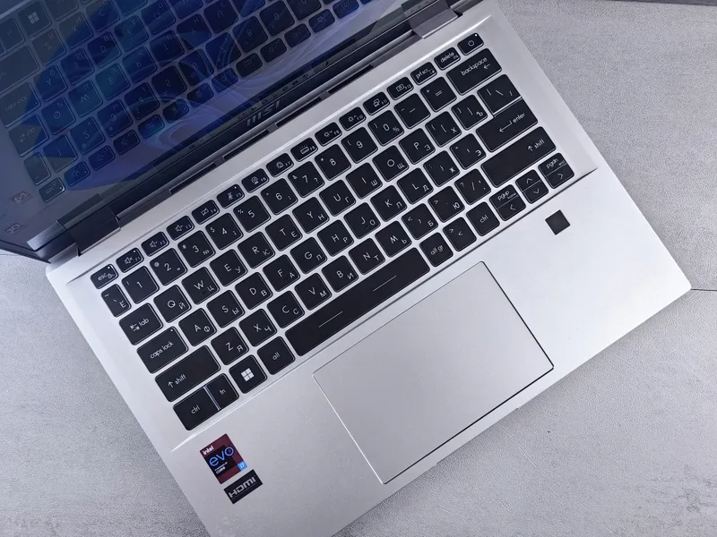 Open laptop computer on a desk ready for an online application