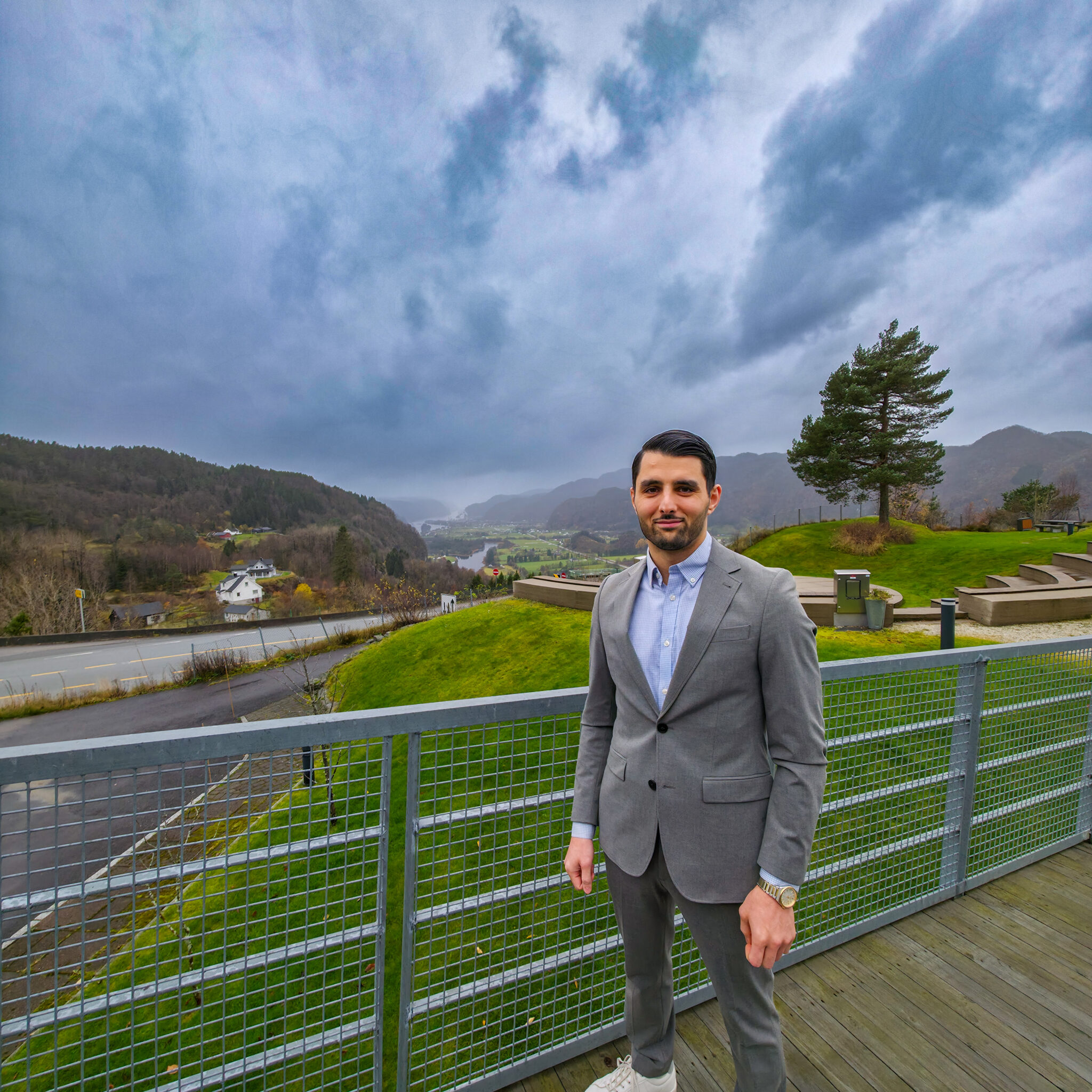Ibrahim Isajev looking out over Kvinesdal from Utsikten Hotel
