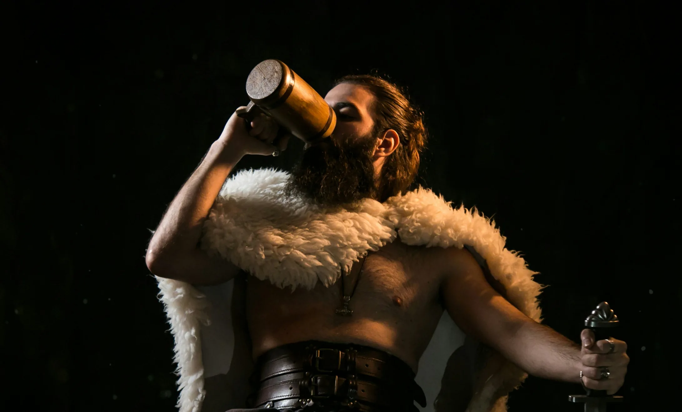 Viking winter feast scene with fire and mead