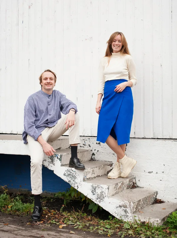 Kine Jæger-Larasse and Nicolai Larasse of KINICO Architects sitting on concrete steps
