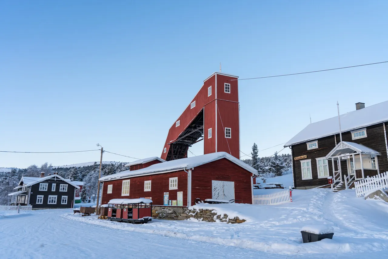 Historic mining buildings and mountain landscape in Folldal