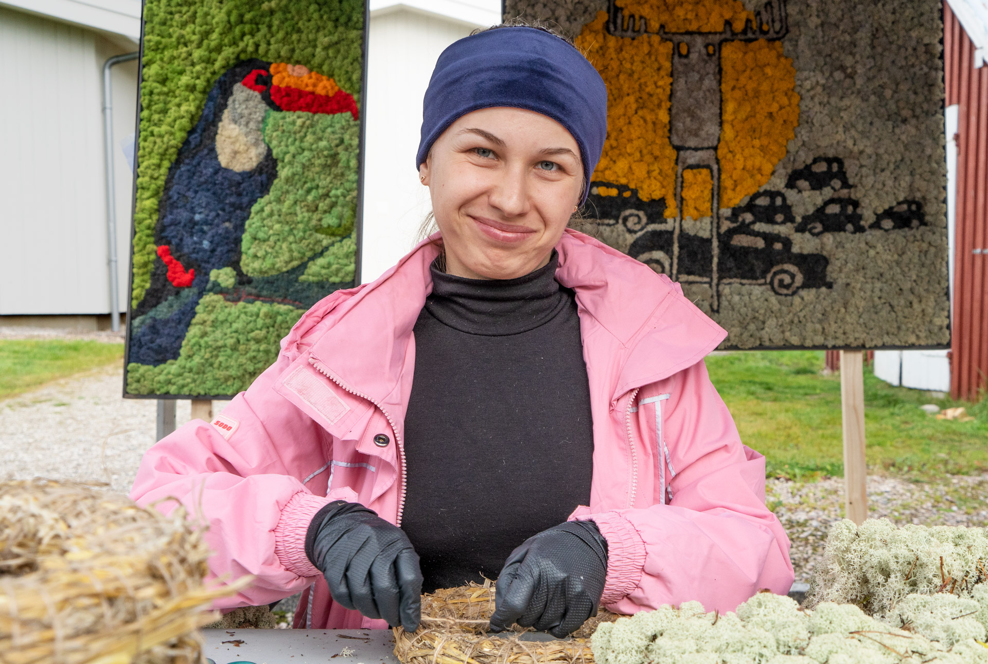 A floral decorator at work with moss from Rendalen