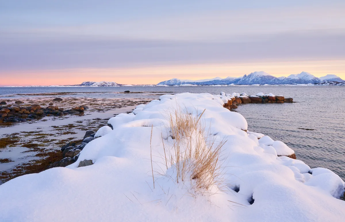 Snowy fields in Aukra