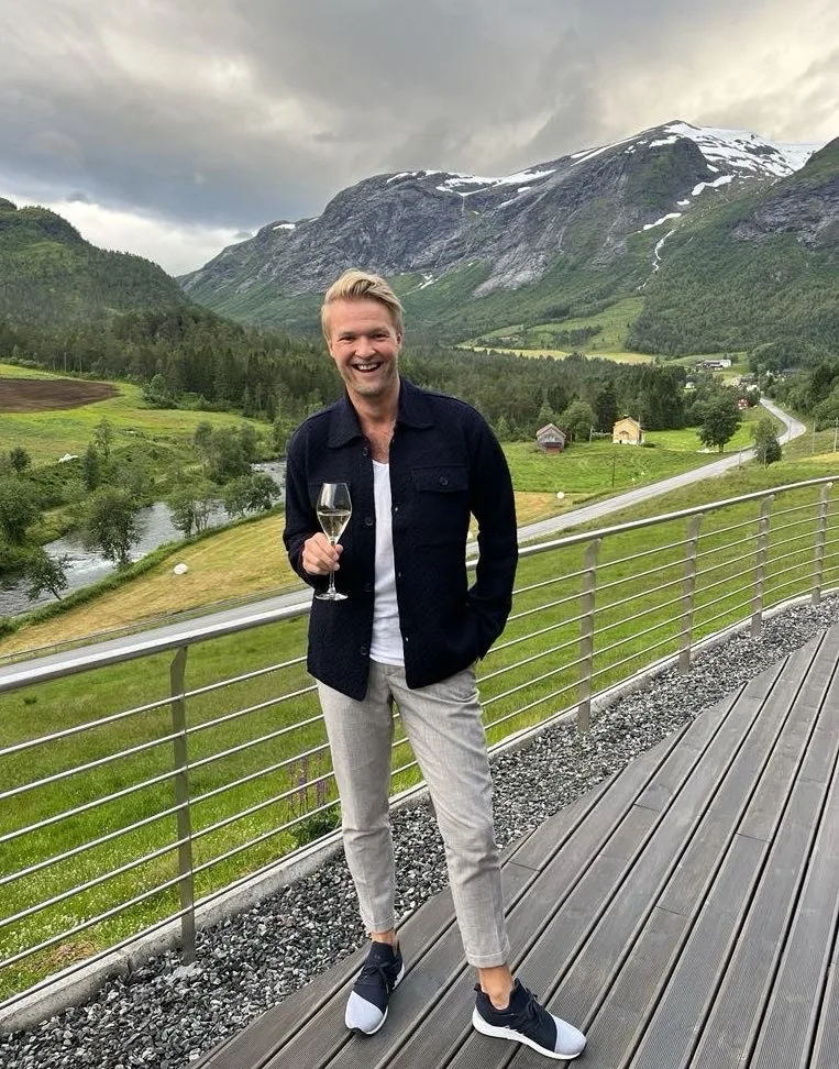Karl Kristian Langeland in Hellesylt with mountains in the background